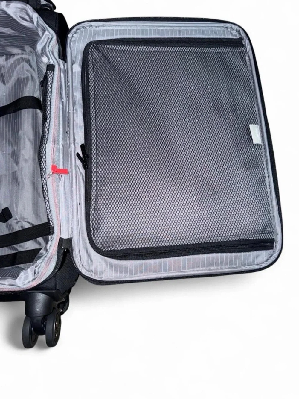 Delsey Paris Black soft-side Carry-On Spinner luggage 22”